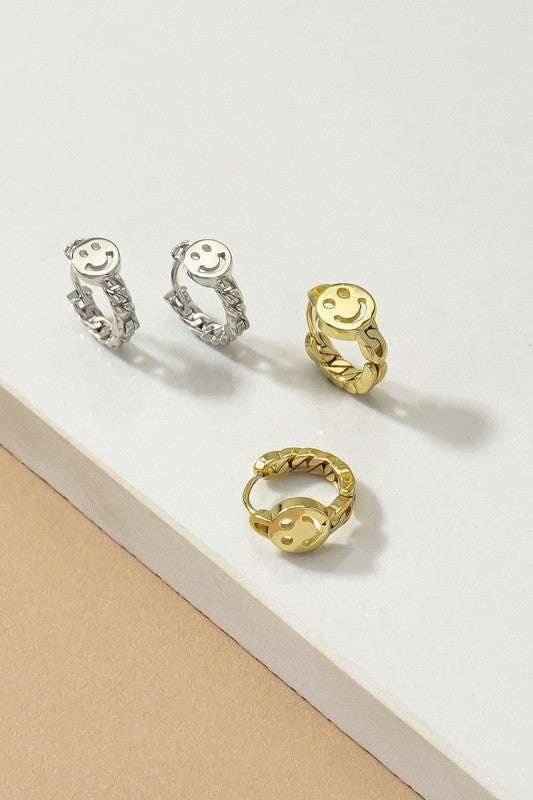 Smiley face huggie hoop earrings