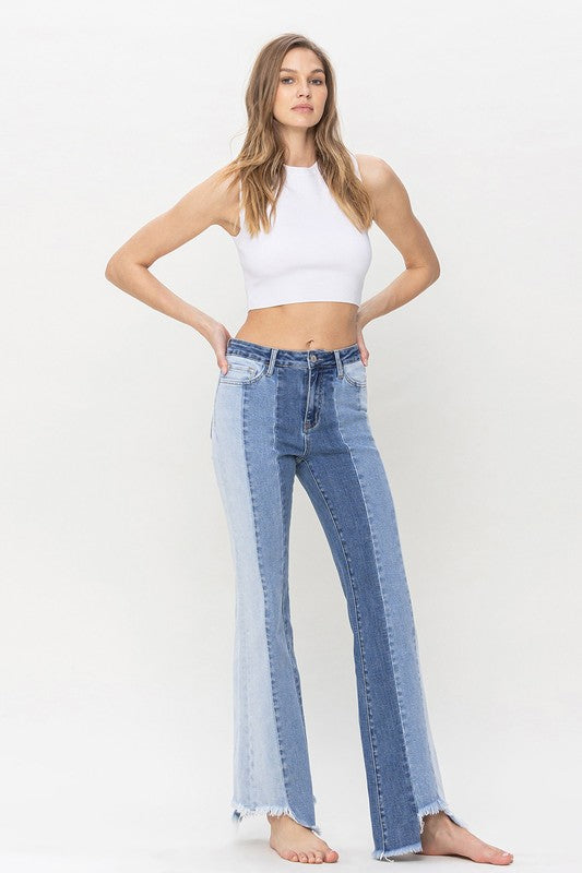 High Rise Relaxed Flare Jeans With Uneven Raw Hem from Vervet