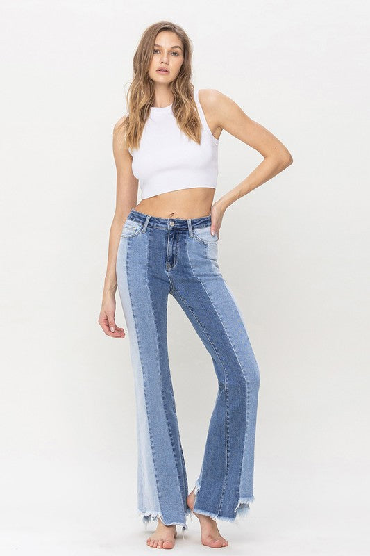 High Rise Relaxed Flare Jeans With Uneven Raw Hem from Vervet