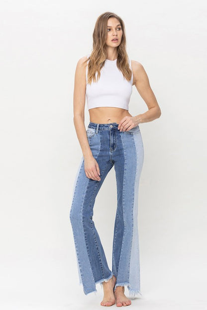 High Rise Relaxed Flare Jeans With Uneven Raw Hem from Vervet