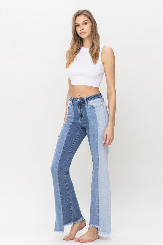 High Rise Relaxed Flare Jeans With Uneven Raw Hem from Vervet